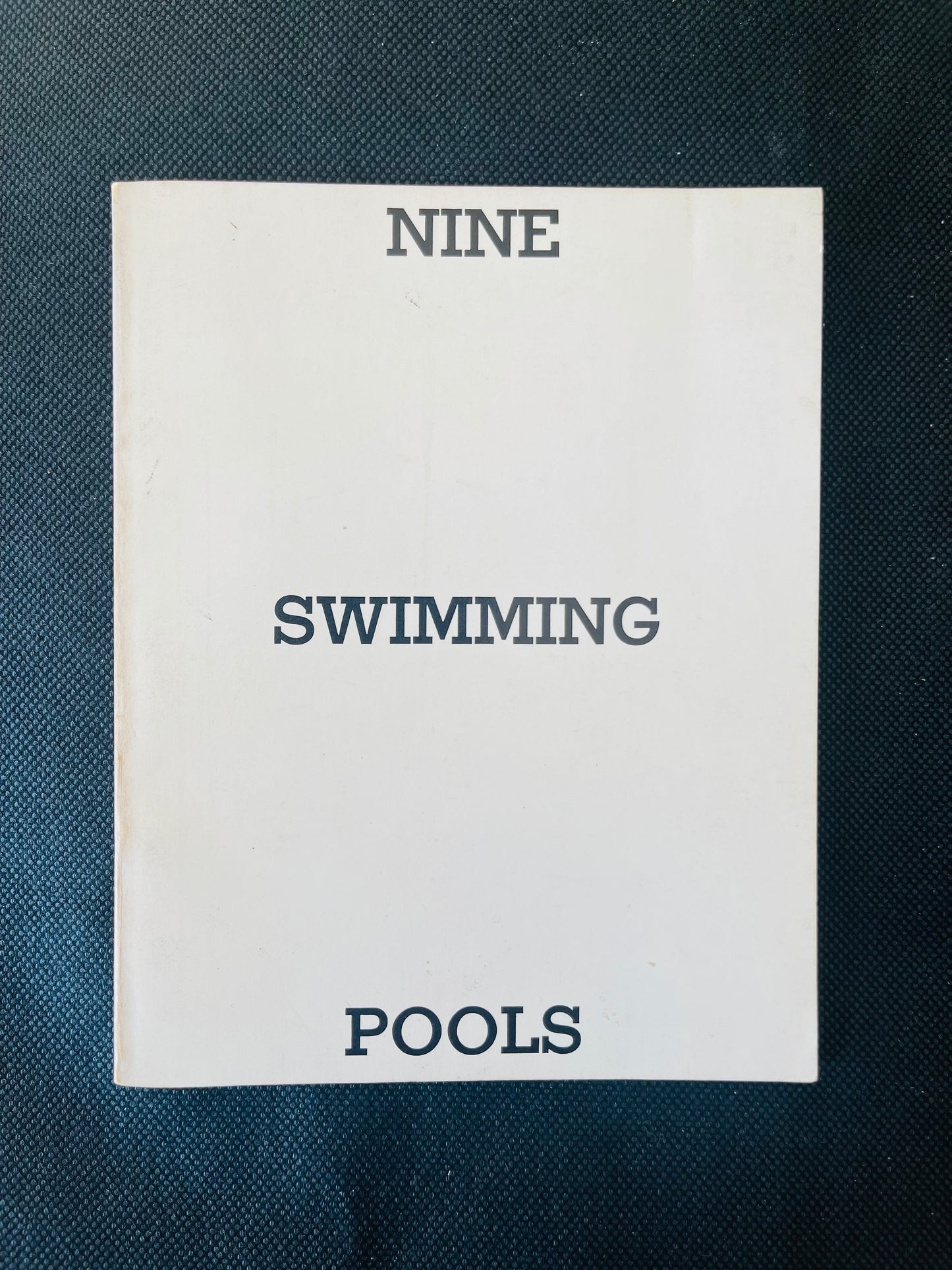 Ed Ruscha
Nine Swimming Pools and A Broken Glass 1976 inscribed by Michael Childers